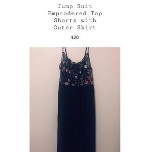 Long Charlotte Russe jump suit with over skirt.